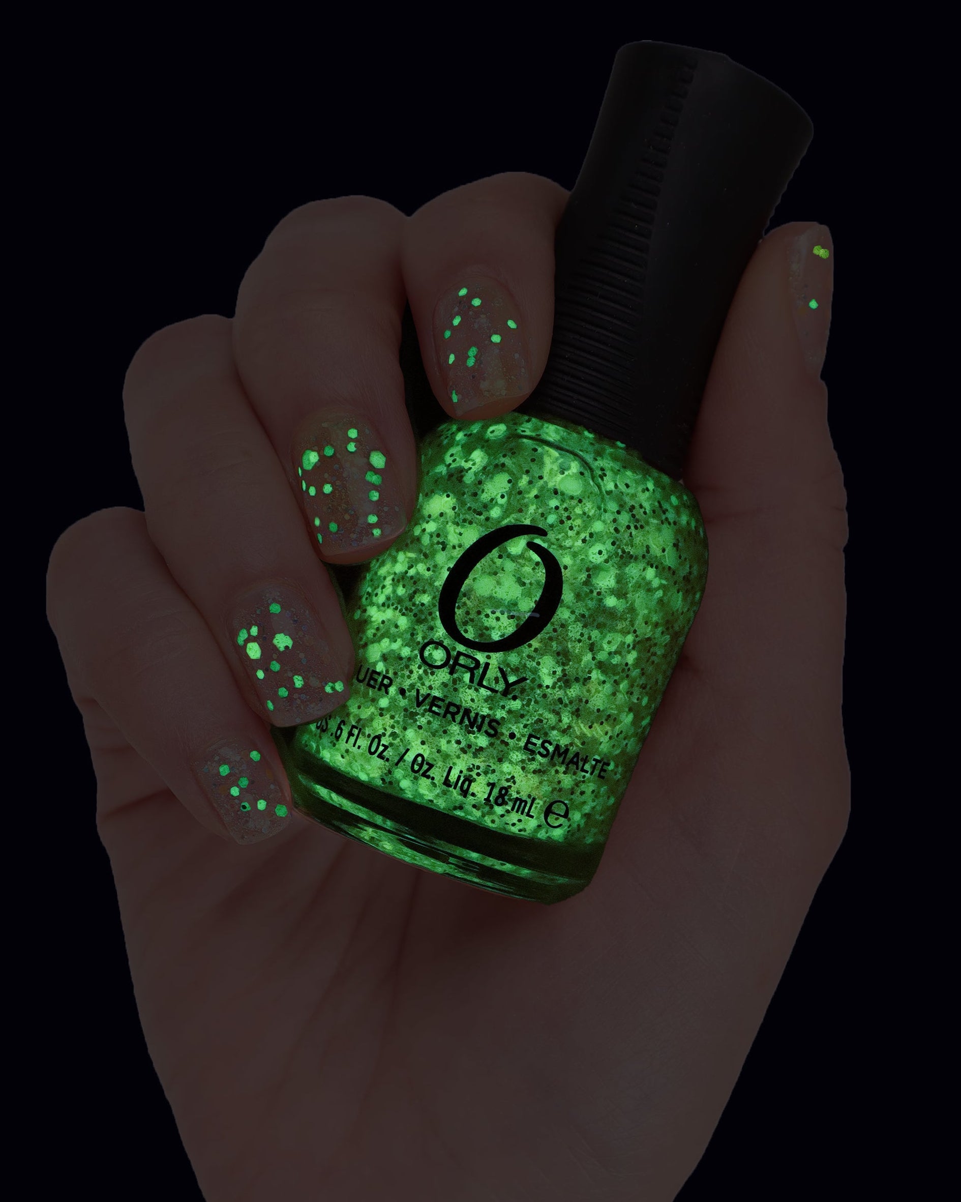 Green glitter glowing manicure 